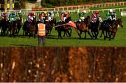 29 December 2020; A view of the field as they bypass the last fence due to the low sun during the Adare Manor Opportunity Handicap Steeplechase on day four of the Leopardstown Christmas Festival at Leopardstown Racecourse in Dublin. Photo by Seb Daly/Sportsfile