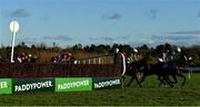 29 December 2020; A view of the field as they bypass the last fence due to the low sun during the Adare Manor Opportunity Handicap Steeplechase on day four of the Leopardstown Christmas Festival at Leopardstown Racecourse in Dublin. Photo by Seb Daly/Sportsfile
