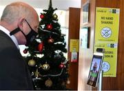 29 December 2020; FAI President Gerry McAnaney has his temperature checked upon arriving to the FAI AGM at FAI Headquarters in Abbotstown, Dublin. Photo by Eóin Noonan/Sportsfile