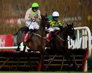 29 December 2020; Sharjah, left, with Patrick Mullins up, jumps the last alongside eventual fourth place Saint Roi, with Mark Walsh up, on their way to winning the Matheson Hurdle on day four of the Leopardstown Christmas Festival at Leopardstown Racecourse in Dublin. Photo by Seb Daly/Sportsfile