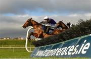 1 January 2021; Mr Coldstone, with Paul Townend up, jumps the last ahead of eventual second place Not Available, with Rachael Blackmore up, on their way to winning the David Flynn Construction Maiden Hurdle at Tramore Racecourse in Waterford. Photo by Seb Daly/Sportsfile