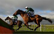 1 January 2021; Coole Arcade, near, with Brian Hayes up, jumps the last on their way to finishing second in the Core Bullion Traders Handicap Hurdle at Tramore Racecourse in Waterford. Photo by Seb Daly/Sportsfile