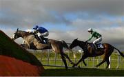 1 January 2021; Shakeytry, with Philip Enright up, jumps the last ahead of eventual third place Doyouthinkso, with Hugh Morgan up, on their way to winning the Core Bullion Traders Handicap Hurdle at Tramore Racecourse in Waterford. Photo by Seb Daly/Sportsfile