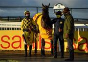 1 January 2021; Jockey Paul Townend, trainer Willie Mullins and Al Boum Photo in the winners enclosure following victory in the Savills New Year's Day Steeplechase at Tramore Racecourse in Waterford. Photo by Seb Daly/Sportsfile