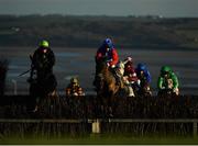 1 January 2021; Itsalonglongroad, left, with Simon Torrens up, jumps the fourth alongside Downthecellar, with Philip Donovan up, on their way to winning the VS Direct No Limits Marketing Rated Novice Steeplechase at Tramore Racecourse in Waterford. Photo by Seb Daly/Sportsfile