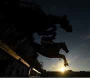 1 January 2021; Ballea Fox, near, with Barry John Foley up, jumps the fourth alongside Downthecellar, with Philip Donovan up, during the VS Direct No Limits Marketing Rated Novice Steeplechase at Tramore Racecourse in Waterford. Photo by Seb Daly/Sportsfile