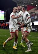 2 January 2021; Ethan McIlroy of Ulster is congratulated by team-mates Matt Faddes, left, and Jacob Stockdale after scoring his side's second try during the Guinness PRO14 match between Ulster and Munster at Kingspan Stadium in Belfast. Photo by David Fitzgerald/Sportsfile
