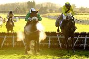 3 January 2021; Ballyshannon Rose, left, with Paddy Kennedy up, jump the last on their way to winning the Follow Us On Social Media Handicap Hurdle ahead of eventual second place Call The Tune, with Mark Bolger up, at Fairyhouse Racecourse in Ratoath, Meath. Photo by Matt Browne/Sportsfile