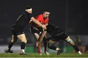 9 January 2021; JJ Hanrahan of Munster is tackled by Shane Delahunt, left, and Quinn Roux of Connacht during the Guinness PRO14 match between Connacht and Munster at the Sportsground in Galway. Photo by David Fitzgerald/Sportsfile
