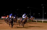 11 January 2021; Emphatic, left, with Ross Coakley up, races alongside eventual second place Buachaill Or, with Rory Cleary up, on their way to winning the Join Us On Instagram @dundalk_stadium Handicap DIV II at Dundalk Stadium, in Louth. Photo by Seb Daly/Sportsfile