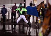 11 January 2021; Jockey Donagh O'Connor jumps a puddle in the parade ring prior to the Join Us On Instagram @dundalk_stadium Handicap DIV II at Dundalk Stadium, in Louth. Photo by Seb Daly/Sportsfile