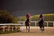 11 January 2021; Jockey Gary Carroll and Red Heel, left, alongside third place Tanseeq, and jockey Shane Foley, return to the parade ring following victory in the Join Us On Instagram @dundalk_stadium Handicap DIV I at Dundalk Stadium, in Louth. Photo by Seb Daly/Sportsfile