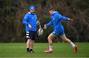 18 January 2021; Jordan Larmour, watched by Kicking coach and lead performance analyst Emmet Farrell during Leinster Rugby squad training at UCD in Dublin. Photo by Ramsey Cardy/Sportsfile