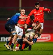 23 January 2021; Peter O’Mahony of Munster is tackled by Will Connors, left, and Garry Ringrose of Leinster during the Guinness PRO14 match between Munster and Leinster at Thomond Park in Limerick. Photo by Ramsey Cardy/Sportsfile