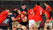 23 January 2021; Jean Kleyn of Munster is tackled by Rónan Kelleher, left, and James Ryan of Leinster during the Guinness PRO14 match between Munster and Leinster at Thomond Park in Limerick. Photo by Ramsey Cardy/Sportsfile