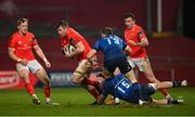 23 January 2021; Peter O’Mahony of Munster is tackled by Hugo Keenan and Garry Ringrose of Leinster during the Guinness PRO14 match between Munster and Leinster at Thomond Park in Limerick. Photo by Ramsey Cardy/Sportsfile