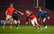 23 January 2021; Keith Earls of Munster in action against Garry Ringrose, left, and Jamison Gibson-Park of Leinster during the Guinness PRO14 match between Munster and Leinster at Thomond Park in Limerick. Photo by Ramsey Cardy/Sportsfile