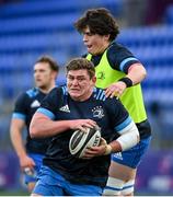 25 January 2021; Tadhg Furlong, left, is tackled by Alex Soroka during Leinster Rugby squad training at Energia Park in Dublin. Photo by Ramsey Cardy/Sportsfile