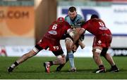 30 January 2021; Ross Molony of Leinster is tackled by Blade Thomson, left, and Uzair Cassiem of Scarlets during the Guinness PRO14 match between Scarlets and Leinster at Parc y Scarlets in Llanelli, Wales. Photo by Chris Fairweather/Sportsfile