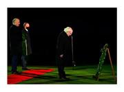 21 November 2020; Solemn, sombre and appropriate. The President of Ireland, Michael D Higgins, pauses for a moment after placing a wreath during the GAA’s Bloody Sunday commemoration in Croke Park, with GAA president John Horan and the Taoiseach Micheál Martin standing behind him. On Sunday 21st November 1920, 14 people were murdered in Croke Park when Crown Forces opened fire on spectators ahead of a football match between Tipperary and Dublin. Tipperary footballer Michael Hogan was one of those killed that day and the main stand in the stadium, the Hogan Stand, is named after him. A dignified and moving ceremony concluded with the words: “We will remember them all. Cuimhnínis orthu uilig.”. Photo by Brendan Moran/Sportsfile This image may be reproduced free of charge when used in conjunction with a review of the book &quot;A Season of Sundays 2020&quot;. All other usage © Sportsfile