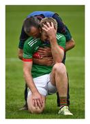 27 September 2020; Say it ain’t so. Noel McGrath, being comforted by his team manager and uncle Frankie McGrath, endures the anguish of losing a county final in the last minute for the second time in seven days - sometimes lightning does strike twice. After Kiladangan broke Loughmore-Castleiney’s hearts in the hurling decider the previous Sunday, Clonmel Commercials pile on the agony with a point in the last minute of normal time, and so take their fifth football title of the decade. Photo by Ray McManus/Sportsfile This image may be reproduced free of charge when used in conjunction with a review of the book &quot;A Season of Sundays 2020&quot;. All other usage © Sportsfile