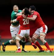 7 February 2021; Iain Henderson of Ireland is tackled by Josh Navidi and Adam Beard of Wales during the Guinness Six Nations Rugby Championship match between Wales and Ireland at the Principality Stadium in Cardiff, Wales. Photo by Chris Fairweather/Sportsfile