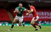 7 February 2021; Keith Earls of Ireland is tackled by Tomos Williams of Wales during the Guinness Six Nations Rugby Championship match between Wales and Ireland at the Principality Stadium in Cardiff, Wales. Photo by Chris Fairweather/Sportsfile