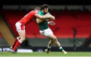 7 February 2021; Robbie Henshaw of Ireland is tackled by Dan Biggar of Wales during the Guinness Six Nations Rugby Championship match between Wales and Ireland at the Principality Stadium in Cardiff, Wales. Photo by Chris Fairweather/Sportsfile