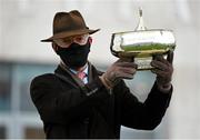 7 February 2021; Trainer Willie Mullins celebrates with the trophy after sending out Kemboy to win the Paddy Power Irish Gold Cup on day two of the Dublin Racing Festival at Leopardstown Racecourse in Dublin. Photo by Seb Daly/Sportsfile