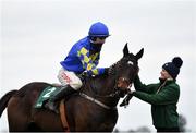 7 February 2021; Jockey Danny Mullins and groom Ruth Dudfield celebrate with Kemboy after winning the Paddy Power Irish Gold Cup on day two of the Dublin Racing Festival at Leopardstown Racecourse in Dublin. Photo by Seb Daly/Sportsfile