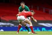 7 February 2021; Jonathan Sexton of Ireland is tackled by Dan Biggar of Wales during the Guinness Six Nations Rugby Championship match between Wales and Ireland at the Principality Stadium in Cardiff, Wales. Photo by Chris Fairweather/Sportsfile