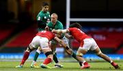 7 February 2021; Keith Earls of Ireland is tackled by Alun Wyn Jones and Josh Navidi of Wales during the Guinness Six Nations Rugby Championship match between Wales and Ireland at the Principality Stadium in Cardiff, Wales. Photo by Gareth Everett/Sportsfile