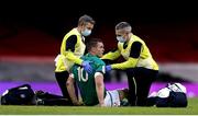 7 February 2021; Jonathan Sexton of Ireland is attended to by team physio Keith Fox, left, and team doctor Dr Ciaran Cosgrave during the Guinness Six Nations Rugby Championship match between Wales and Ireland at the Principality Stadium in Cardiff, Wales. Photo by Gareth Everett/Sportsfile