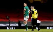 7 February 2021; Jonathan Sexton of Ireland leaves the pitch with team doctor Dr Ciaran Cosgrave during the Guinness Six Nations Rugby Championship match between Wales and Ireland at the Principality Stadium in Cardiff, Wales. Photo by Gareth Everett/Sportsfile
