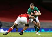 7 February 2021; Jonathan Sexton of Ireland in action against Taulupe Faletau of Wales during the Guinness Six Nations Rugby Championship match between Wales and Ireland at the Principality Stadium in Cardiff, Wales. Photo by Gareth Everett/Sportsfile