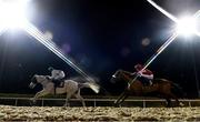 12 February 2021; (EDITOR'S NOTE: This image was created using a starburst filter) Togoville, left, with Conor McGovern up, and Porterinthejungle, with Luke McAteer up, during the Dundalkstadium.com Apprentice Handicap (Div 2) at Dundalk Racecourse in Louth. Photo by Harry Murphy/Sportsfile