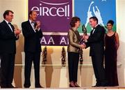 4 December 1998; Galway footballer Seán Óg de Paor is presented with his Eircell GAA All Star award by President Mary McAleese, in the company of Uachtarán Chumann Lúthchleas Gael Joe McDonagh, left, Eircell CEO Stephen Brewer, and Eircell hostess and the current Rose of Tralee Luzveminda O'Sullivan, during the 1998 Eircell GAA All Star Awards Banquet at The Burlington Hotel in Dublin. Photo by Ray McManus/Sportsfile