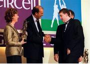 4 December 1998; Offaly hurler Brian Whelahan is congratulated by Eircell CEO Stephen Brewer before being presented with his Eircell GAA All Star award by President Mary McAleese, in the company of Uachtarán Chumann Lúthchleas Gael Joe McDonagh, right, during the 1998 Eircell GAA All Star Awards Banquet at The Burlington Hotel in Dublin. Photo by Brendan Moran/Sportsfile