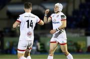 19 February 2021; Michael Lowry of Ulster celebrates his try with team-mate Craig Gilroy, left, during the Guinness PRO14 match between Glasgow Warriors and Ulster at Scotstoun Stadium in Glasgow, Scotland. Photo by Alan Harvey/Sportsfile