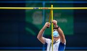 20 February 2021; The high jump bar height is adjusted and measured by an official wearing a face mask during day one of the Irish Life Health Elite Athlete Indoor Micro Meet at Sport Ireland National Indoor Arena at the Sport Ireland Campus in Dublin. Photo by Sam Barnes/Sportsfile