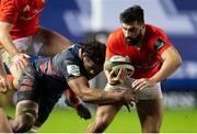 20 February 2021; Damian de Allende of Munster is tackled by Bill Mata of Edinburgh during the Guinness PRO14 match between Edinburgh and Munster at BT Murrayfield Stadium in Edinburgh, Scotland. Photo by Paul Devlin/Sportsfile