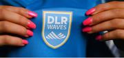 20 February 2021; A detailed view of the DLR Waves crest being held by Katie Burdis during a DLR Waves portrait session ahead of the 2021 SSE Airtricity Women's National League season at Dún Laoghaire-Rathdown County Council All-Weather Pitches in Stepaside, Dublin. Photo by Stephen McCarthy/Sportsfile