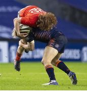 20 February 2021; Ben Healy of Munster is tackled by Jaco van der Walt of Edinburgh during the Guinness PRO14 match between Edinburgh and Munster at BT Murrayfield Stadium in Edinburgh, Scotland. Photo by Paul Devlin/Sportsfile