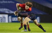 20 February 2021; Ben Healy of Munster is tackled by Jaco van der Walt of Edinburgh during the Guinness PRO14 match between Edinburgh and Munster at BT Murrayfield Stadium in Edinburgh, Scotland. Photo by Paul Devlin/Sportsfile