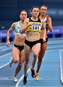 21 February 2021; Phil Healy of Bandon AC, Cork, centre, on her way to winning the Women's 400m, with a PB of 51.99, ahead of Sophie Becker of Raheny Shamrock AC, Dublin, left, who finished second, and Sharlene Mawdsley of Newport AC, Tipperary, who finished third, during day two of the Irish Life Health Elite Athlete Indoor Micro Meet at Sport Ireland National Indoor Arena at the Sport Ireland Campus in Dublin. Photo by Sam Barnes/Sportsfile