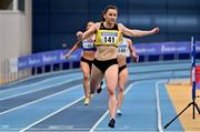 21 February 2021; Phil Healy of Bandon AC, Cork, crosses the line to win the Women's 400m, with a PB of 51.99, during day two of the Irish Life Health Elite Athlete Indoor Micro Meet at Sport Ireland National Indoor Arena at the Sport Ireland Campus in Dublin. Photo by Sam Barnes/Sportsfile