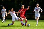 21 February 2021; Alec Byrne of Cork City is tackled by Jamie Lennon of St Patrick's Athletic during the pre-season friendly match between Cork City and St Patrick's Athletic at O'Shea Park in Blarney, Cork. Photo by Eóin Noonan/Sportsfile