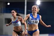 21 February 2021; Molly Scott of St Laurence O'Tooles AC, Carlow, right, smiles after winning the Women's 60m, ahead of Kate Doherty of Dundrum South Dublin AC, centre, who finished third,  during day two of the Irish Life Health Elite Athlete Indoor Micro Meet at Sport Ireland National Indoor Arena at the Sport Ireland Campus in Dublin. Photo by Sam Barnes/Sportsfile