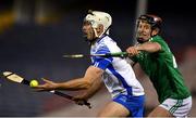 15 November 2020; Shane McNulty of Waterford clears under pressure from David Dempsey of Limerick during the Munster GAA Hurling Senior Championship Final match between Limerick and Waterford at Semple Stadium in Thurles, Tipperary. Photo by Ray McManus/Sportsfile