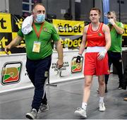 25 February 2021; Michaela Walsh of Ireland, accompanied by coach Zauri Antia, reacts following her defeat to Karina Tazabekova of Russia in their women's lightweight 57kg quarter-final bout during the AIBA Strandja Memorial Boxing Tournament at Sofia in Bulgaria. Photo by Alex Nicodim/Sportsfile